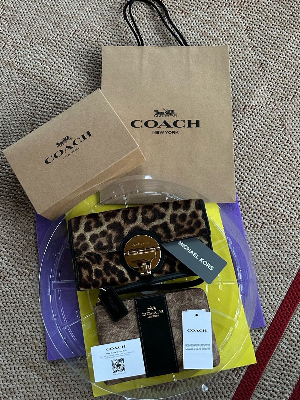 Coach Authentic Wristlet Pouch Accompanied by a Michael Kors Pre-loved Wallet